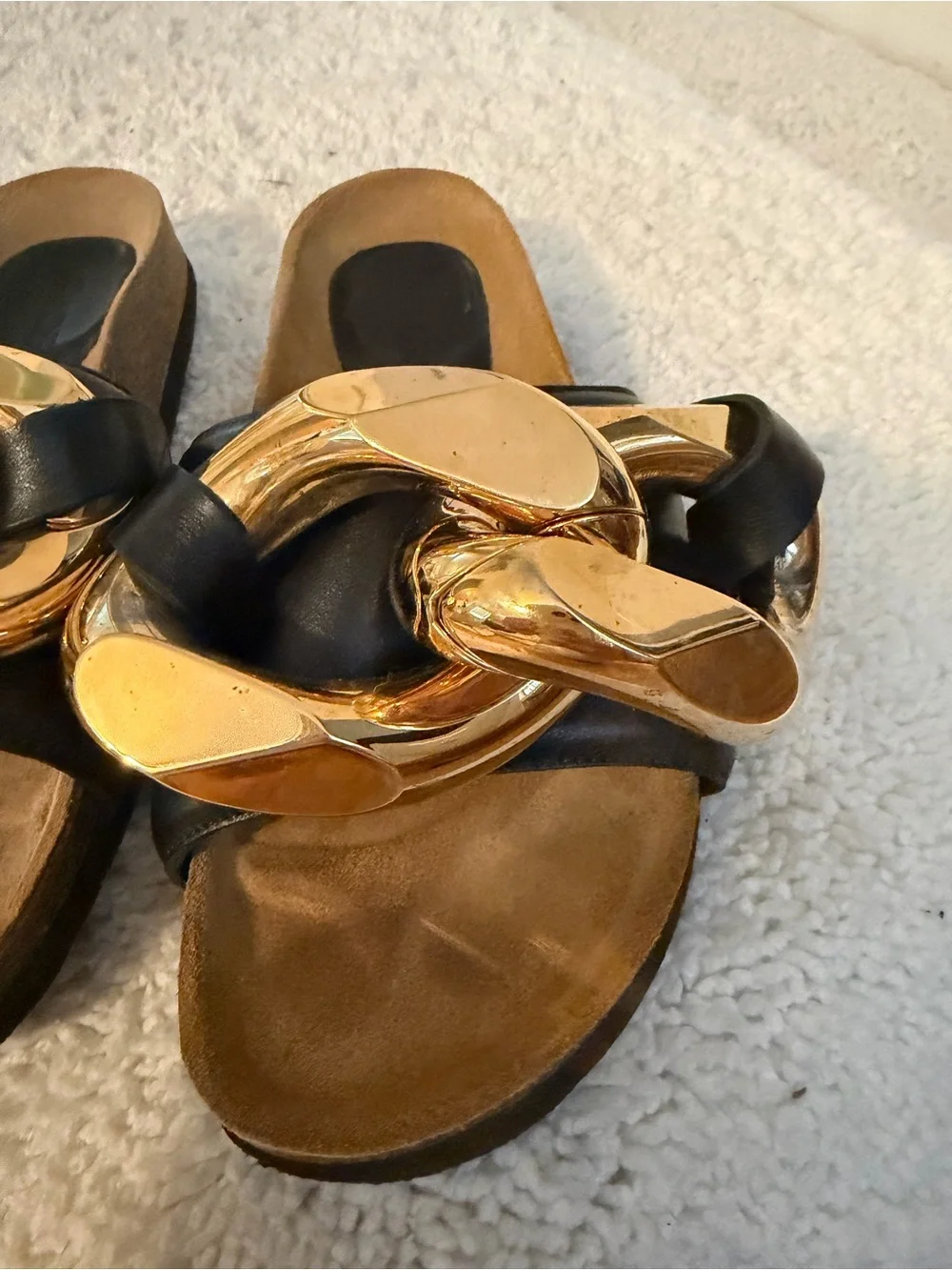 JW Anderson Women’s Black Slide Sandals with Gold Chain Accent
